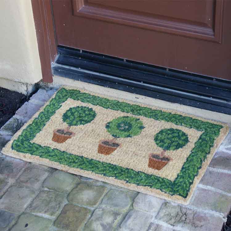 Grandmas_Plants_Action3_Large Resilient Grandmas Plants mat in front of door