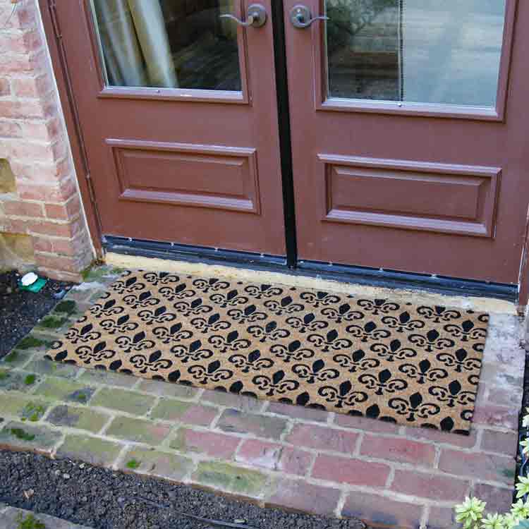 St.-Germaine-Fleur_Action_02_24x57_Large St. Germaine Fleur de Lis Doormat in front of door