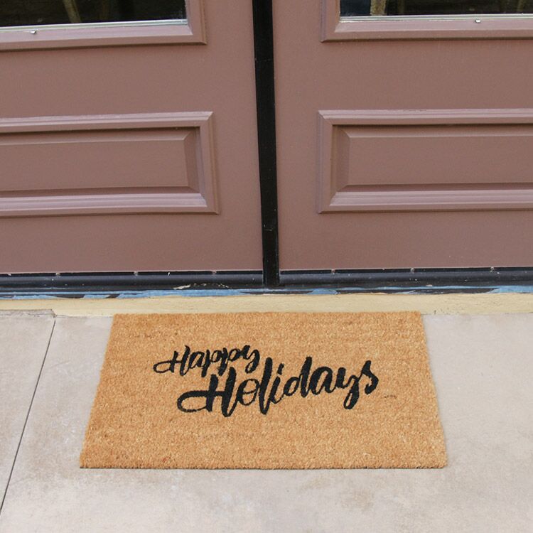HappyHolidaysToAll-Action-02_Large Happy Holidays written in white text with a white bear next to it and snowflakes