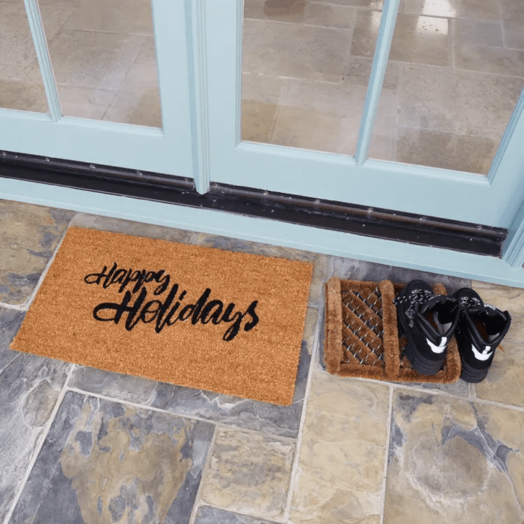 happy-holidays-to-all-with-bootscraper-02-action_Large Happy Holidays written in white text with a white bear next to it and snowflakes