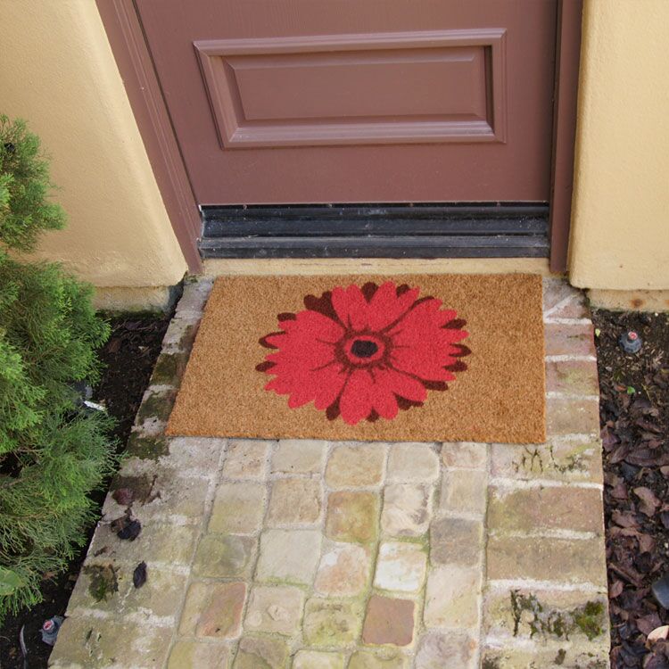 red_daisy_action1_Large brown door mat with a red daisy design in front of brown door