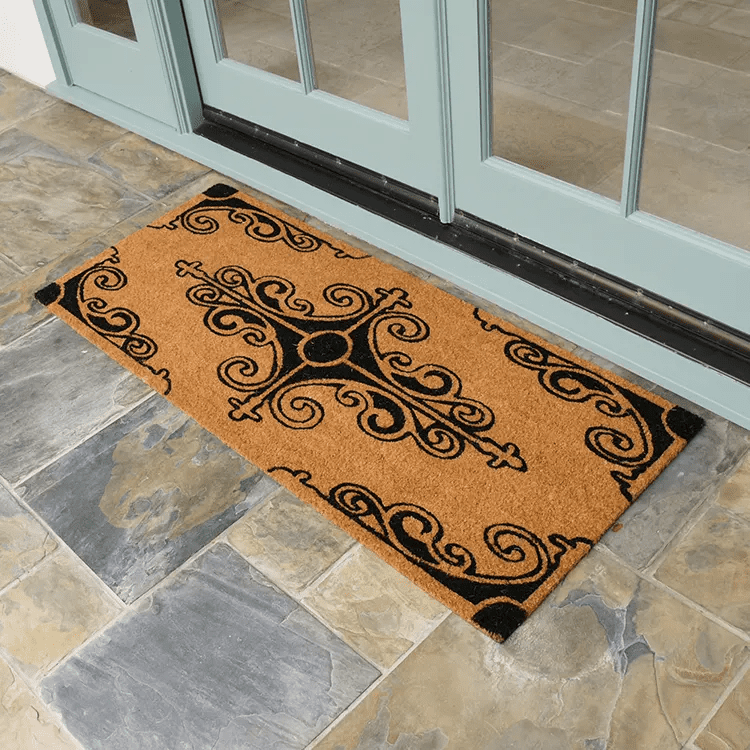 traditional-fleur-de-lis-double-door-01-action_Large Traditional Fleur de Lis French Mat in front of white double doors