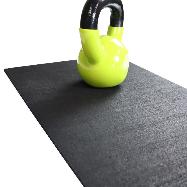 Kettle-Bell-on-Top-of Custom-Cut-Recycled-Rubber-Mat Kettle-Bell-on-Top-of Custom-Cut-Recycled-Rubber-Mat