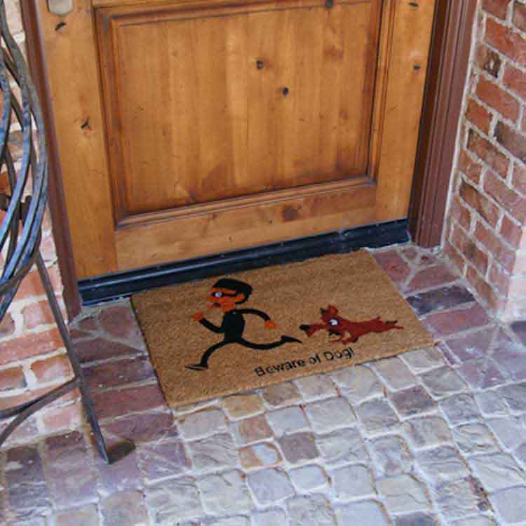 Beware of dog welcome mat in front of door