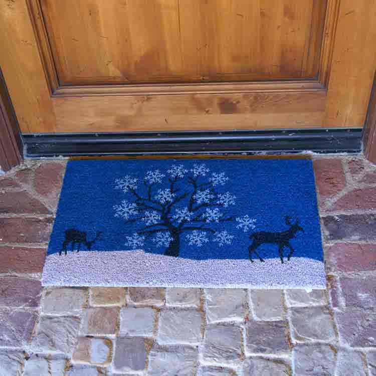 Blue_Sky_Action2_Large Holiday Doormats with a Blue Sky tree and a pair of deers in Mind in front of brown door