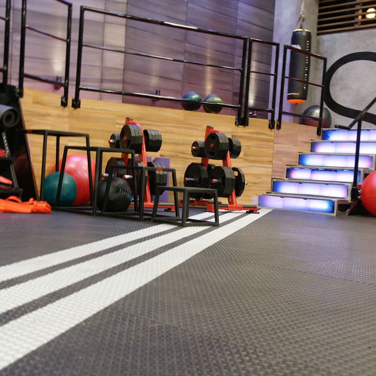 Diamond_Plate_Action6b_Large Diamond Plate underneath weights in a gym