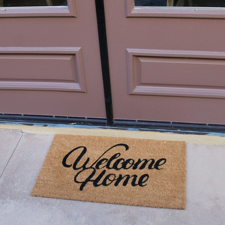 GreetingsFromYourHumbleAbode Action 02 750x750 1 Greetings from your humble abode! welcome home doormat in front of door