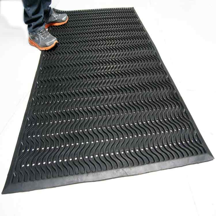 Ultra_Scraper_Action_Shot_3A_Large Black Color Commercial Entrance Mat, Promotes Safety and Slip-Protection man standing