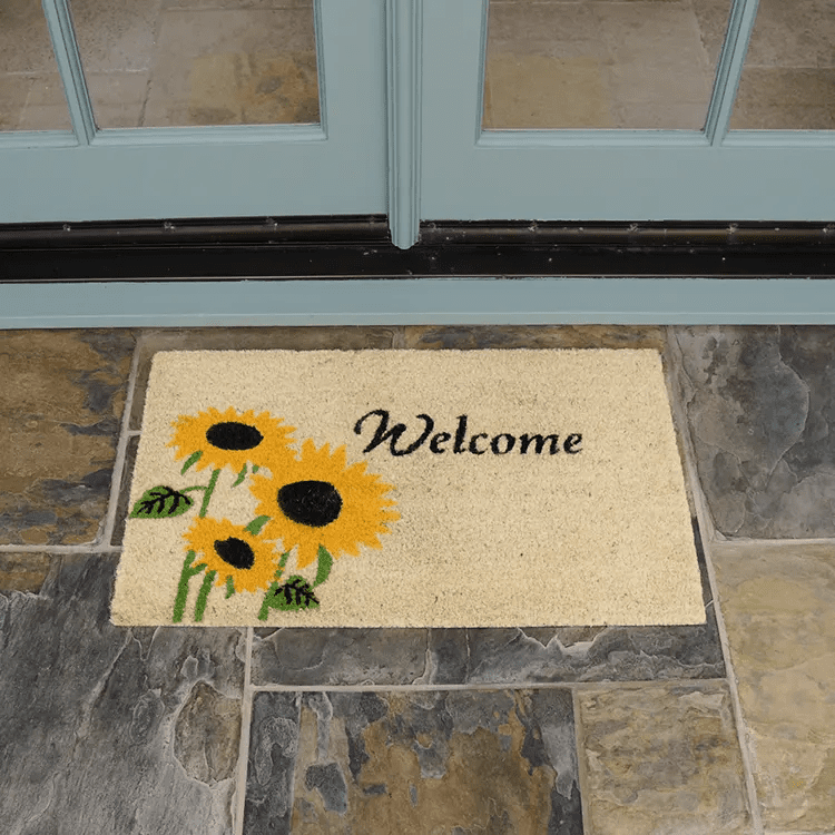 sunflower-22-action_Large Welcome mat with sunflower design in front of white double door